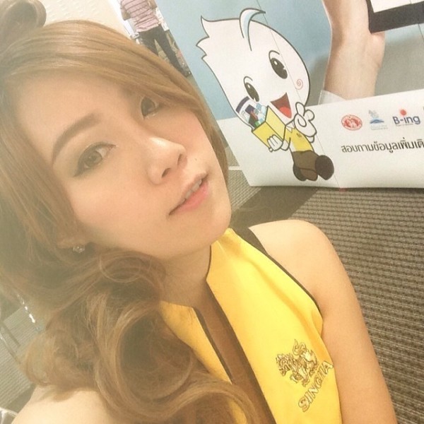 Симпатичная тайка на выставке в Бангкоке